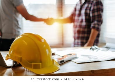 yellow-safety-helmet-on-workplace-260nw-1410507824.jpg